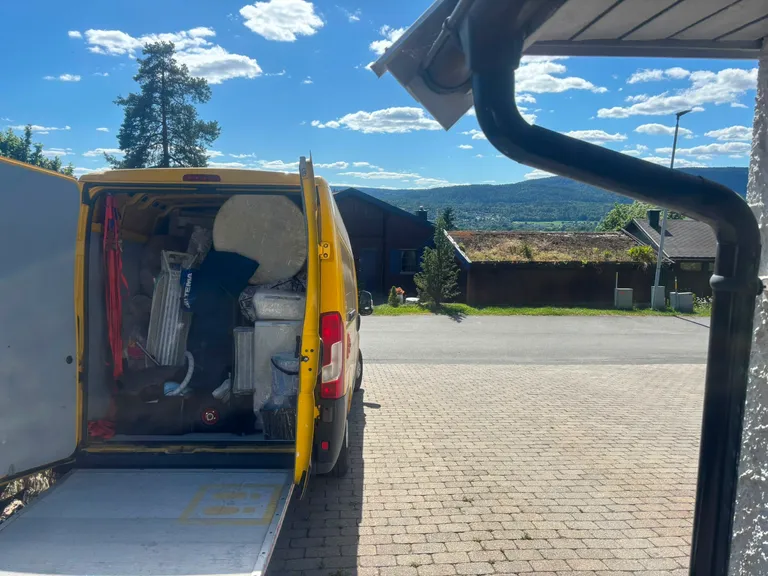 NB-Palvelut moving van ready for unloading at a customer's door on an international move